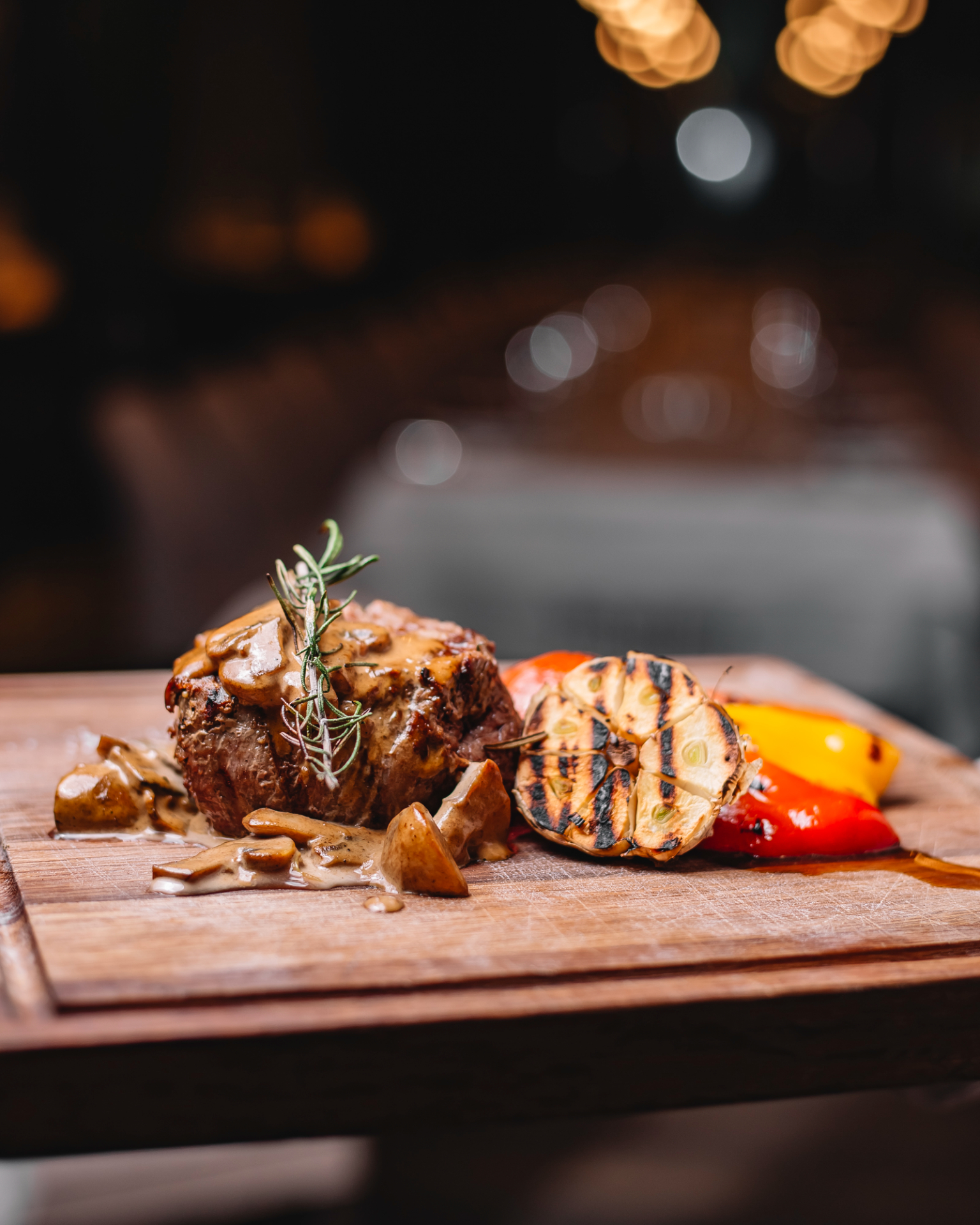 side-view-grilled-beef-meat-served-with-mushrooms-